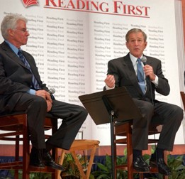 Dr. Reid Lyon is pictured on the left with President George W. Bush
