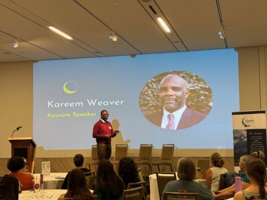 Kareem Weaver speaking at the 2024 Symposium