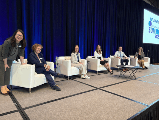 summit speakers on stage summit speakers on stage