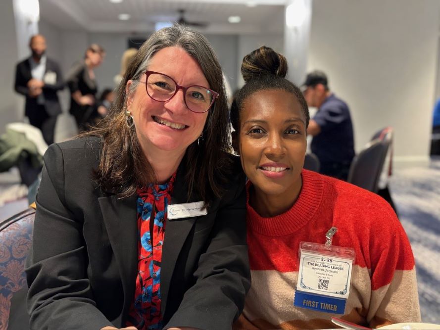 Dr. Maria Murray posing with a first time attendee at TRLConf2025