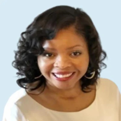 Danesha Rawles Smith headshot with blue background