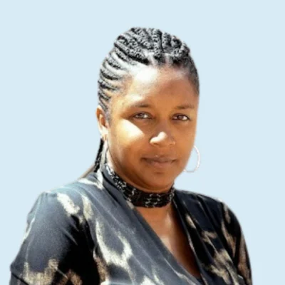 Dionna Latimer Hearn headshot with blue background