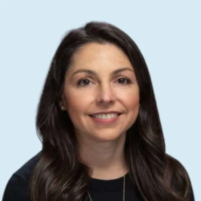 Jill Pentimonti headshot with blue background