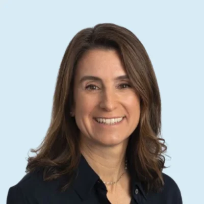 Magdalenda Zavalia headshot with blue background