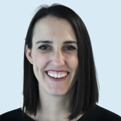 MaryKate DeSantis headshot with blue background