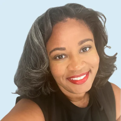 Miah Daughtery headshot with blue background