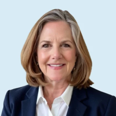 Monica McHale Small headshot with blue background