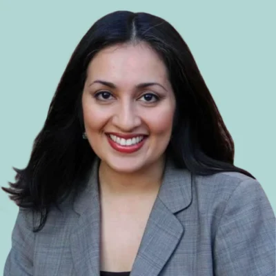 Sonia Cabell headshot with green background