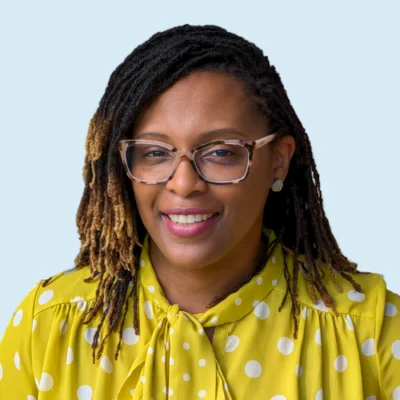 Lakeisha Johnson headshot with blue background