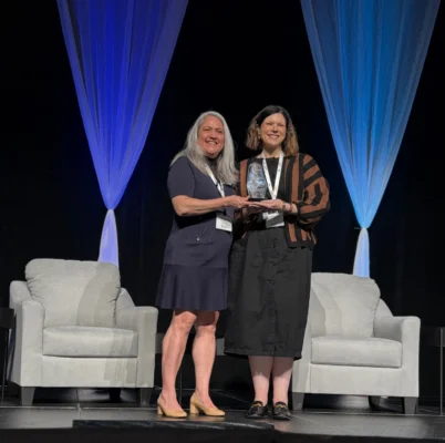 Jessica Toste accepts the SSSR award at TRL Summit 2026