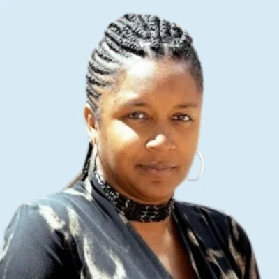 Dionna Latimer Hearn headshot with blue background