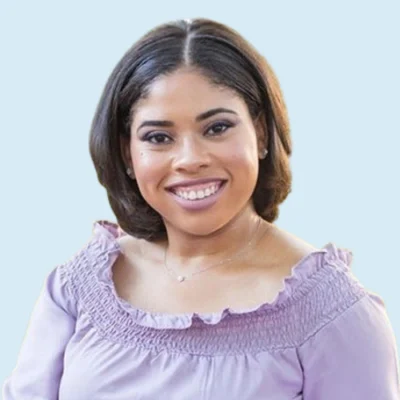 Janee Butler headshot with blue background