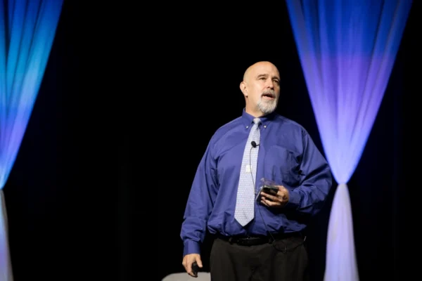 Christopher Schatschneider giving keynote presentation at TRL Summit