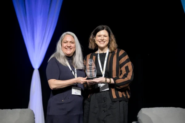 Jessica Toste accepts the SSSR award at The Reading League Summit 2026.