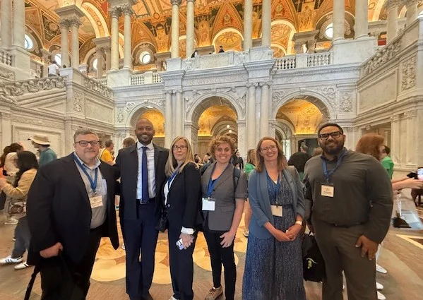 Kari Kurto and other education leaders stand inside the Library of Congress