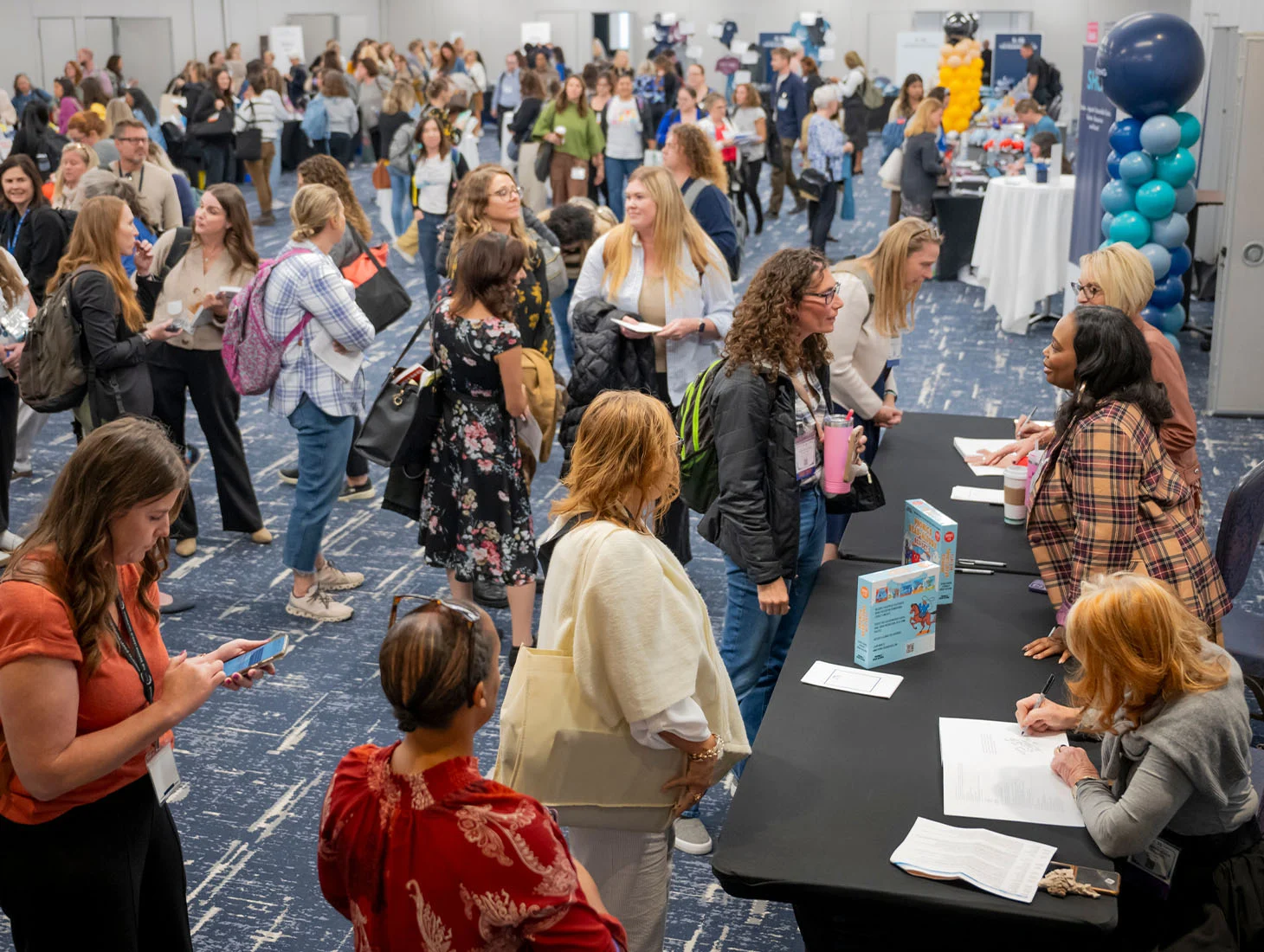 TRL Summit attendees at a book signing